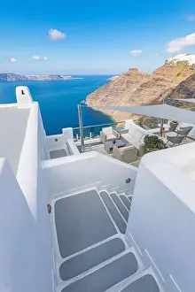 Amazing landscape of Fira, white architecture caldera view Santorini, Greece, cruise ships. Blue sky, wonderful summer mood, sunny vacation, holiday