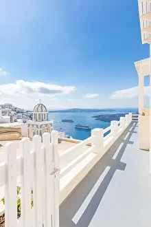 Amazing landscape of Fira, white architecture caldera view Santorini, Greece, cruise ships. Blue sky, wonderful summer mood, sunny vacation, holiday