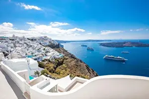 Amazing landscape of Fira, white architecture caldera view Santorini, Greece, cruise ships. Blue sky, wonderful summer mood, sunny vacation, holiday