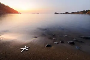 Amazing Mediterranean seascape with golden sand and blue waves. Summer vacations background