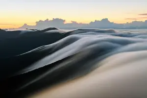 Amazing morning fog in mountains blurred from long exposure. Landscape photography