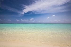 Images Dated 12th August 2022: Amazing nature of tropical summer beach. White sandy beach, lagoon sea water against blue sky with