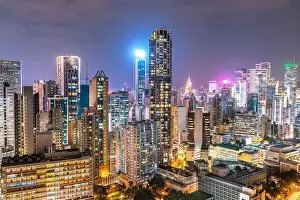 Aerial View Lights Prints: The amazing night and sunset view of cityscape and skyscrapers in Hong-Kong