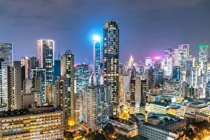 Aerial View Lights Prints: The amazing night and sunset view of cityscape and skyscrapers in Hong-Kong