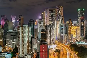The amazing night and sunset view of cityscape and skyscrapers in Hong-Kong