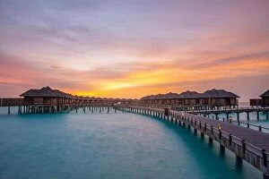 Images Dated 10th August 2019: Amazing panorama beach landscape. Maldives sunset seascape view. Horizon with sea and sky