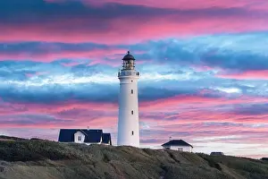 Amazing pink sunset view of Hirtshals lighthouse in Denmark. Landscape photography