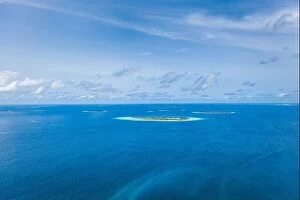 Images Dated 11th August 2019: Amazing seascape, beautiful turquoise tropical ocean water with boat on it top view aerial photo