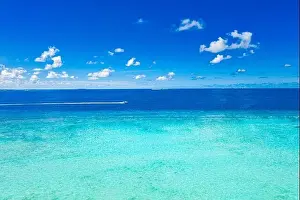 Amazing seascape, beautiful turquoise tropical ocean water with boat on it top view aerial photo. Maldives Indian ocean, aerial seascape, landscape