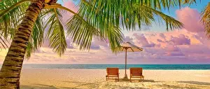Amazing sunset beach. Romantic couple chairs umbrella. Tranquil togetherness love concept scenery, relax beach, beautiful landscape design. Getaway