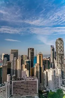 The amazing view of Hong-Kong cityscape full of skyscrapers from the rooftop