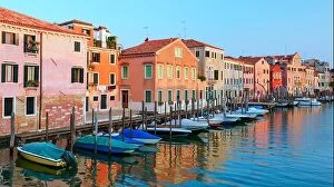 Images Dated 8th August 2014: Amazing view on morning Venice. Row of boats and glowing colourful houses. Italy, Europe