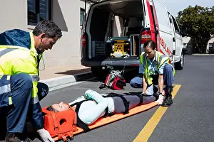 Hurry Prints: Ambulance men taking care of injured people