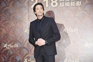 Taipei Prints: American actor Adrien Brody poses at a press conference for his new movie 'Dragon Blade' in Taipei