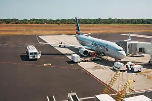 El Salvador Prints: an American Airlines Boeing 737 jet on the ground at El Salvador International Airport