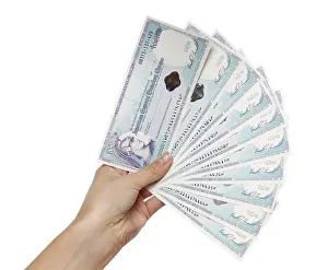 Silo Prints: American Express 1000 dollar travelers cheques in a hand