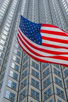 American Flag Prints: American flag set against skyscraper building windows in Downtown Miami