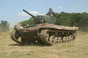 Amphibious Prints: An amphibious Valentine D.D. (Duplex Drive) equipped with collapsable screens and propellers to allow the tank to swim