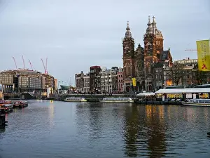 Central Station Prints: Amsterdam Central station and boats on the Canal