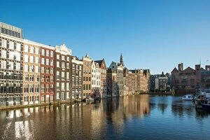 Images Dated 3rd May 2016: Amsterdam city view of Netherlands traditional houses with Amstel river in Amsterdam, Netherlands