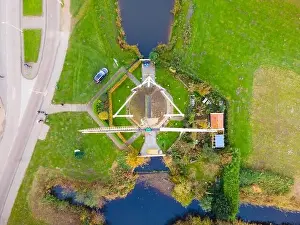 Dike Prints: Amsterdam, The Netherlands, 8th November 2020 Riekermolen near the Amstelpark old dutch windmill aerial