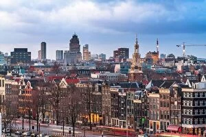 Images Dated 19th February 2020: Amsterdam, Netherlands historic cityscape with the modern Zuidas district in the distance at dusk