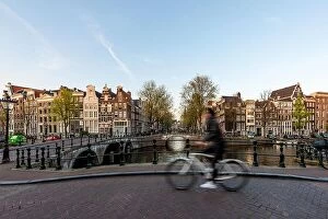Images Dated 4th May 2016: Amsterdam people riding bicycles in historical part in Amsterdam, Netherlands