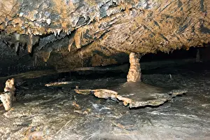 Stalactites Prints: Ancient cave with stalactites and stalagmites