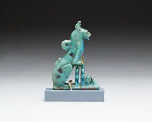 Fertility Prints: This ancient Egyptian amulet features a cat with kittens