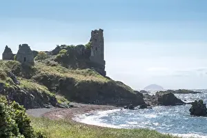 Castle Ruin Prints: The ancient ruins of Castle Dunure with Ailsa Craig in the hazy distance taken on a warm hazy sunny day