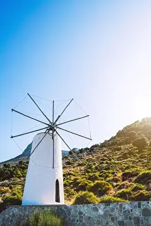 Nesebar Prints: An ancient windmill on the island of Crete. Historical sights of Greece