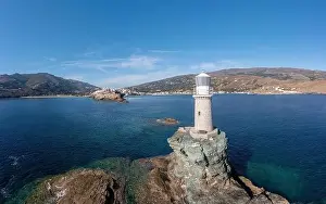 Hora Prints: Andros Island. Greece. The stone beacon on a rock aerial drone view