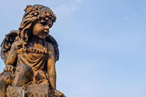 Guardian Prints: Angel statue with blue sky as its background