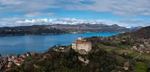 Lago Maggiore Prints: Angera, Italy - 14 March, 2023: view of the historic Borromea Castle near Angera on the shroes of Lake Maggiore