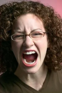 Noise Prints: Angry curly haired young Caucasian woman screaming and yelling loudly