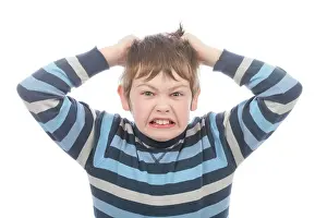 Pulling Prints: Angry Young Boy. Model Released