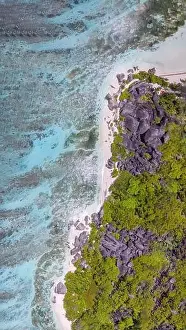 Anse Prints: Anse Source Argent, La Digue. Downward aerial view of tropical coastline and granite rocks