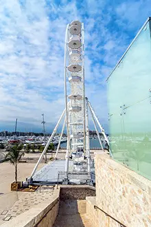 Cote Dazur Prints: Antibes, France - July 01, 2016: day view of port Vauban and grande roue in Antibes