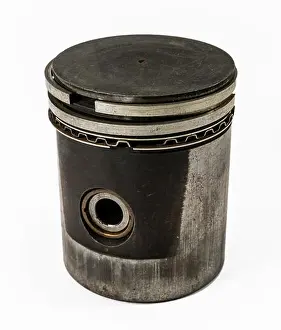 Reflective Prints: Antique automotive cast iron piston and rings