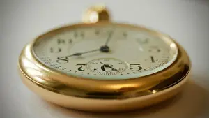 Timepiece Prints: Antique gold pocket watch macro shot, valuable