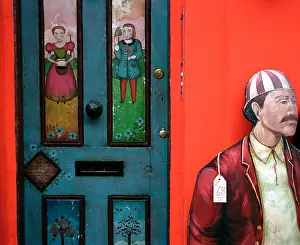 Street Market Prints: Antique painted door and lifesize painted cut out figure Portobello Road street market London
