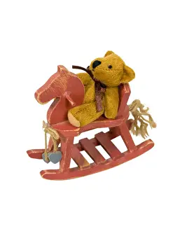 Teddy Prints: Antique retro teddy bear riding a painted wooden retro rocking horse - path included