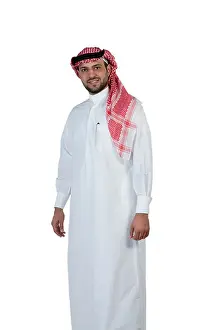 Mid Adult Man Prints: Arab man wearing a traditional dress, looking at the camera