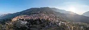 Sunray Prints: Arachova Greece mountain town aerial panoramic view at sunrise