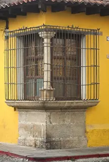 Guatemala Prints: Architectural detail of colonial house in La Antigua Guatemala, window and iron balcony