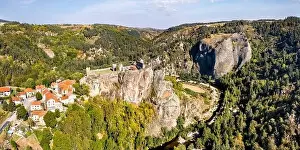 Arlempdes village with its castle on top of a basalt rock at a meander bend of the Loire river. Haute-Loire, France