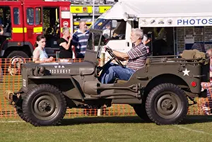 US army jeep camouflaged camouflage open top old biddenden village spectacular day out kent england uk europe