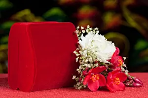 Arrangement with flowers and favors for wedding, baptism and First Communion