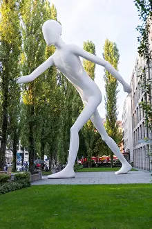 Urban Living Prints: Art Sculpture 'Walking Man' of atrist Jonathan Borofsky in Munich