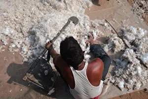 Artisans Prints: Artisans working at a cotton factory during the beating process in the outskirts of Agartala